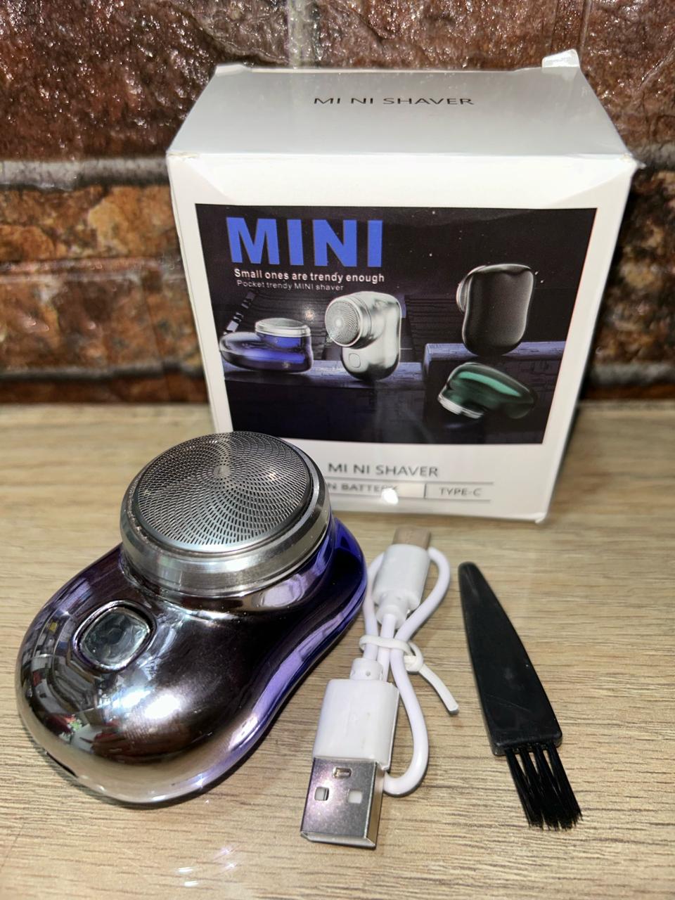 Mini afeitadora eléctrica portátil